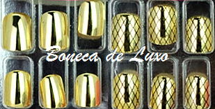 Unhas cromadas douradas