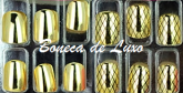 Unhas cromadas douradas